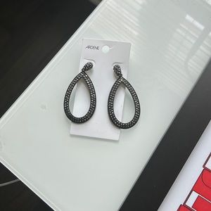 Women’s black and silver earrings